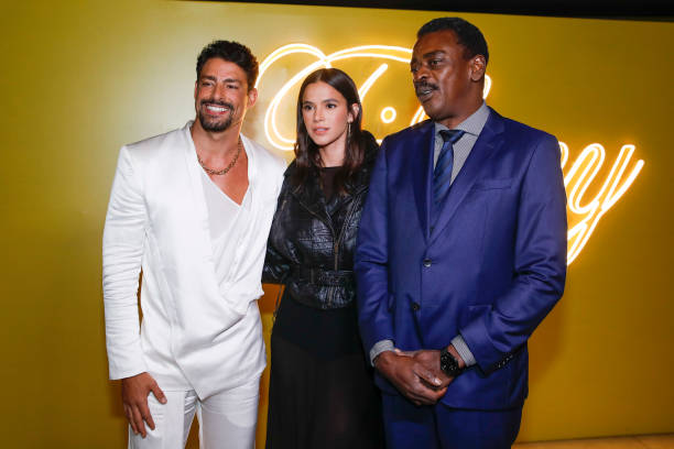 Actor Cauã Raimond, the actress Bruna Marquezine and the singer Seu Jorge poses for pictures on the red carpet of Yellow is the New Blue Event organized by Tiffany & Co. At Memorial da América Latina on August 25, 2022 in Sao Paulo, Brazil. (612×408)