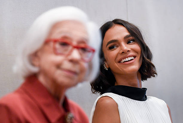 Brazilian actress Bruna Marquezine smiles as Brazilian legendary actress Fernanda Montenegro speaks during a press co...