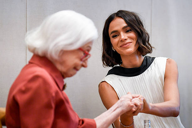 Brazilian legendary actress Fernanda Montenegro is welcomed by actress Bruna Marquezine during a press conference of ...