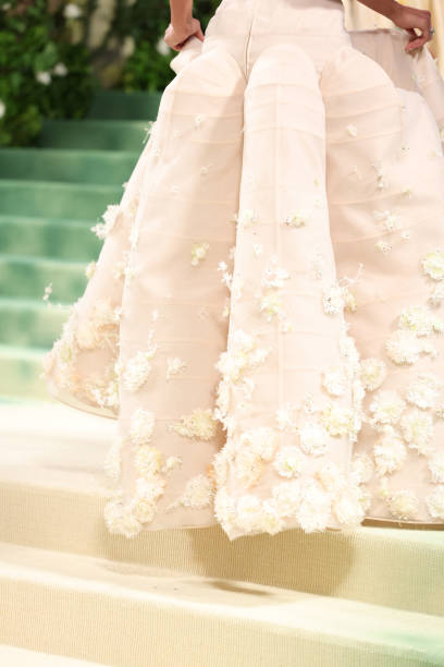 Bruna Marquezine, dress detail, attends The 2024 Met Gala Celebrating "Sleeping Beauties: Reawakening Fashion" at The Metropolitan Museum of Art on May 06, 2024 in New York City.